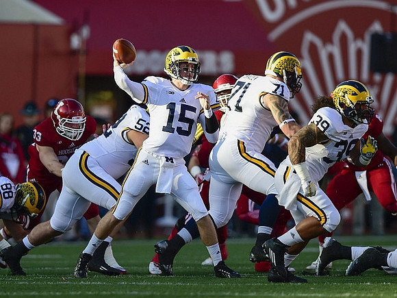 Jake Butt (88), Mason Cole (52), Jake Rudock (15), Ben Braden (71), and Sione Houma (39)