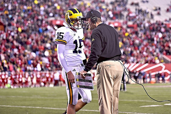 Jake Rudock (15) and Jim Harbaugh