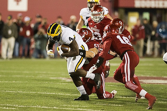 De'Veon Smith (4) and Ben Braden (71)
