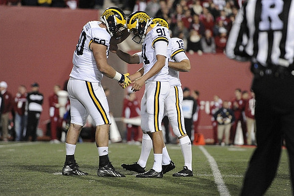 Tom Strobel (50), Kenny Allen (91), and Blake O'Neill (12)