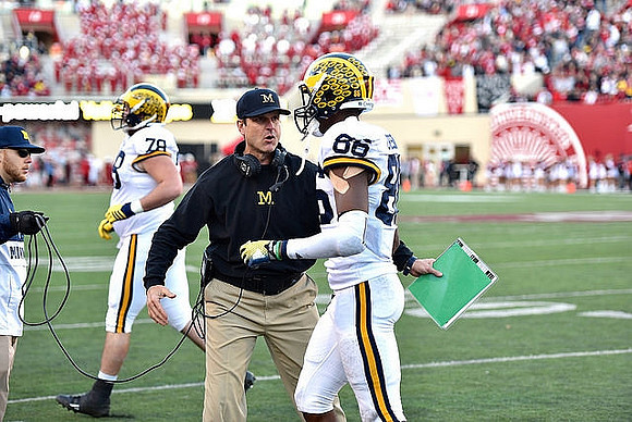 Erik Magnuson (78), Jim Harbaugh, and Jehu Chesson (86)