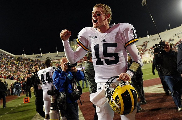 Jake Rudock (15) and Delano Hill (44)