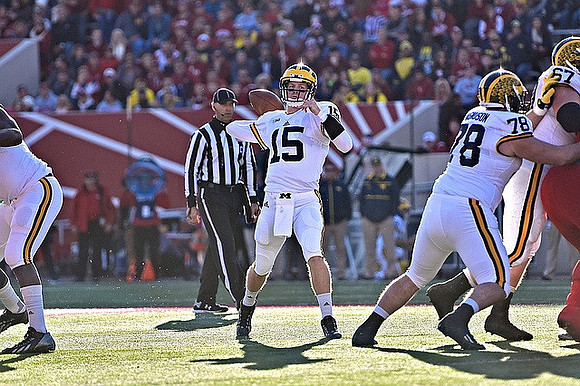 Jake Rudock (15), Erik Magnuson (78), and Kyle Kalis (67)