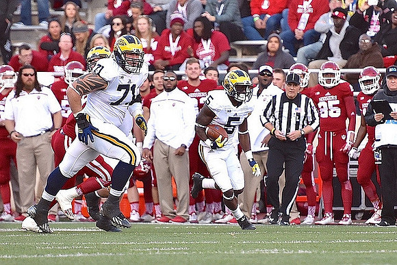 Ben Braden (71) and Jabrill Peppers (5)