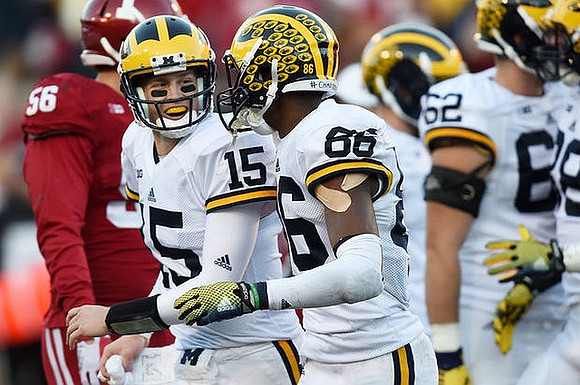 Jake Rudock (15), Jehu Chesson (86), and Blake Bars (62)