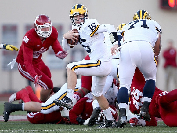 Jake Rudock (15) and Ben Braden (71)