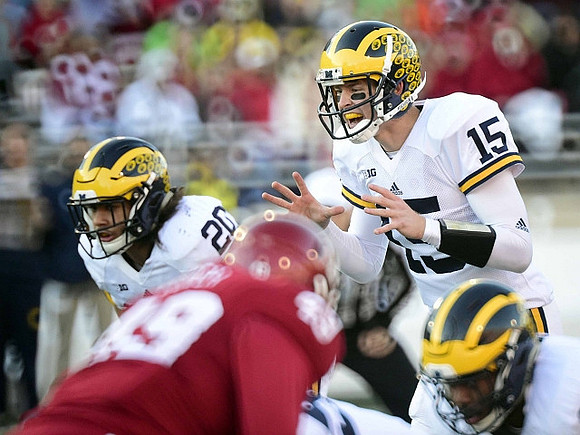 Drake Johnson (20) and Jake Rudock (15)