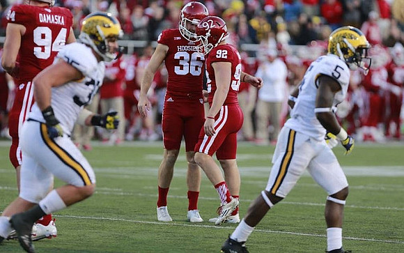 Joe Bolden (35) and Jabrill Peppers (5)