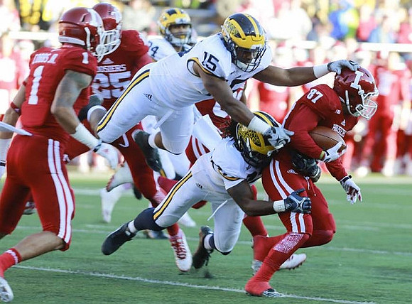 Jeremy Clark (34), James Ross (15), and Jarrod Wilson (22)