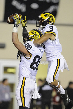 Jake Butt (88) and Grant Perry (9)