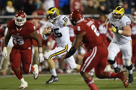Jake Rudock (15) and Graham Glasgow (61)