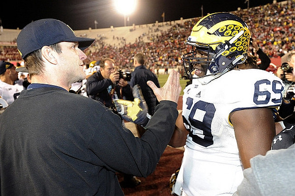 Jim Harbaugh and Willie Henry (69)