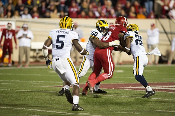 Jabrill Peppers (5), Royce Jenkins-Stone (52), and Jourdan Lewis (26)
