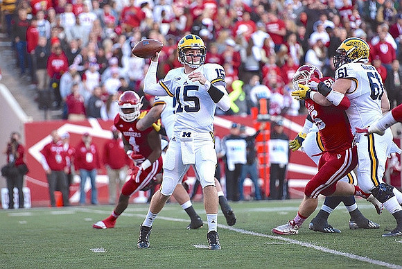 Jake Rudock (15) and Graham Glasgow (61)