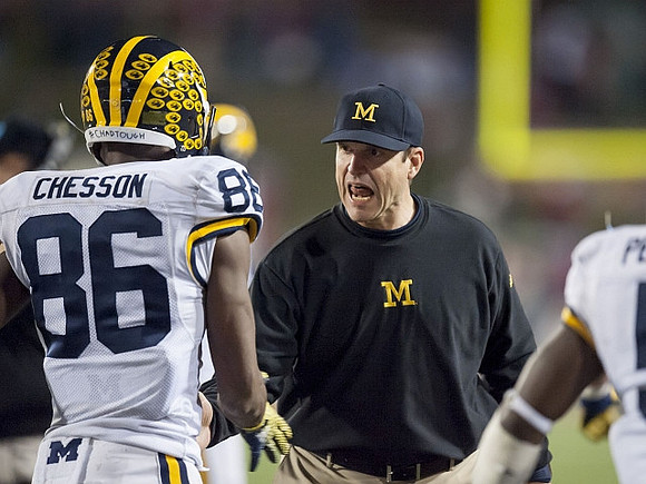 Jehu Chesson (86) and Jim Harbaugh