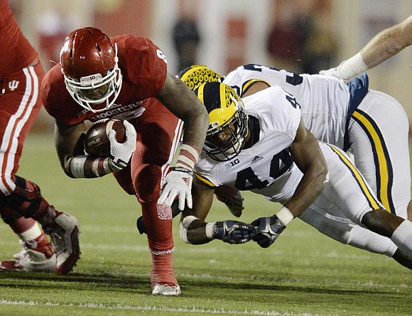 Delano Hill (44) and Taco Charlton (33)