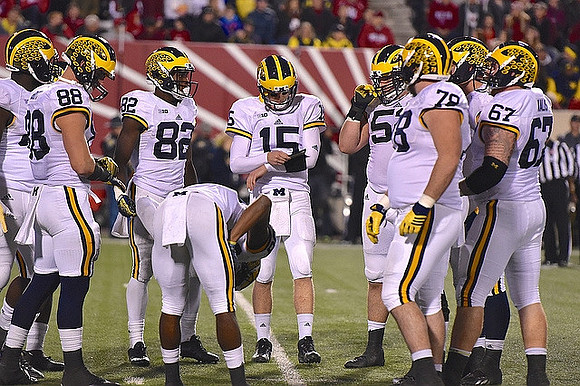 Jake Butt (88), Amara Darboh (82), Jake Rudock (15), Mason Cole (52), Erik Magnuson (78), and Kyle Kalis (67)