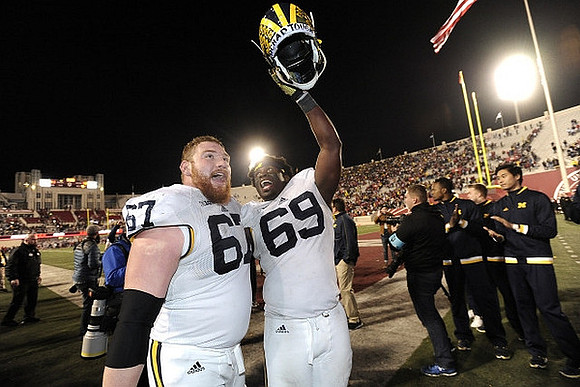 Kyle Kalis (67) and Willie Henry (69)
