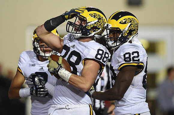 Jake Butt (88), Grant Perry (9), and Amara Darboh (82)