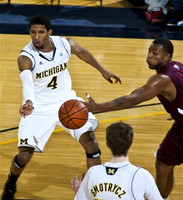 Darius Morris (4) and Evan Smotrycz (23)
