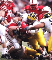 Pierre Woods, Alan Branch, and LaMarr Woodley
