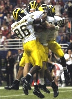 Mario Manningham, Chad Henne, Steve Breaston, and Mike Massey