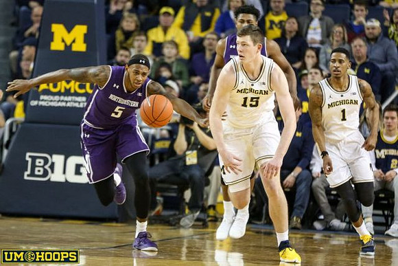 Jon Teske (15) and Charles Matthews (1)