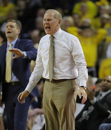 Luke Yaklich and John Beilein