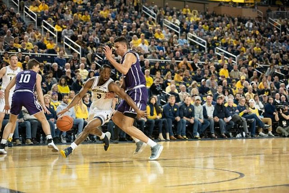 Ignas Brazdeikis (13) and Zavier Simpson (3)