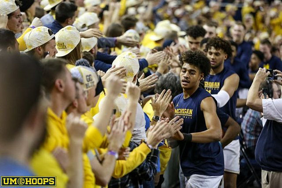 Jordan Poole (2) and Isaiah Livers (4)
