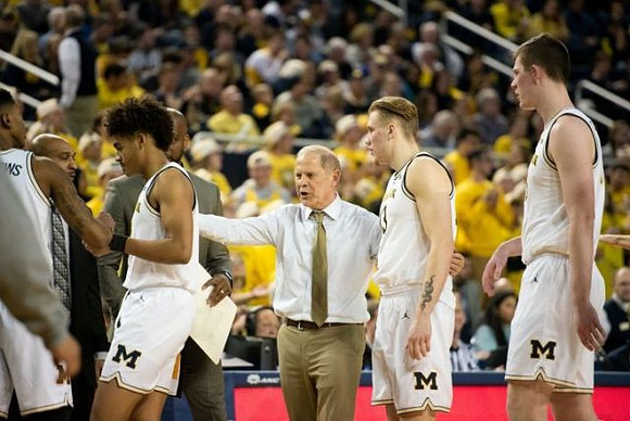 Charles Matthews (1), Saddi Washington, Jordan Poole (2), Deandre Haynes, John Beilein, Ignas Brazdeikis (13), and Jon Teske (15)
