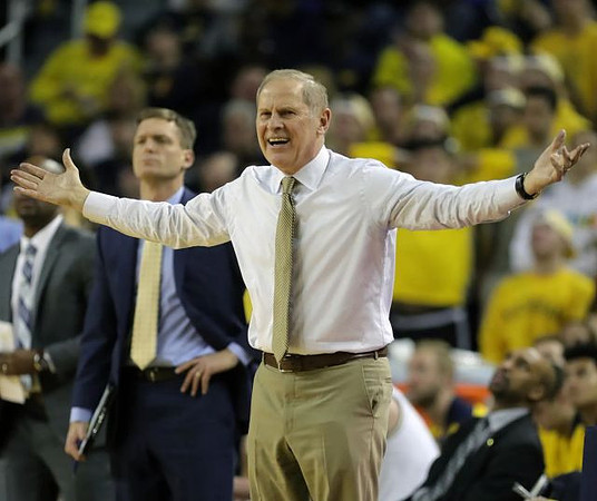 Luke Yaklich and John Beilein