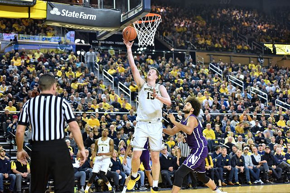 Jon Teske (15) and Charles Matthews (1)