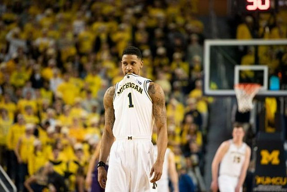 Charles Matthews (1) and Jon Teske (15)