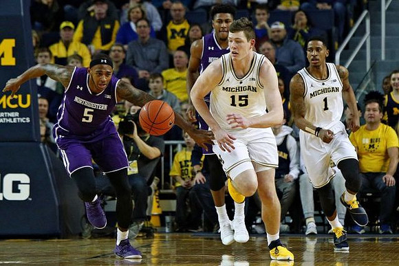 Jon Teske (15) and Charles Matthews (1)