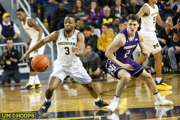 Zavier Simpson (3), Charles Matthews (1), and Eli Brooks (55)