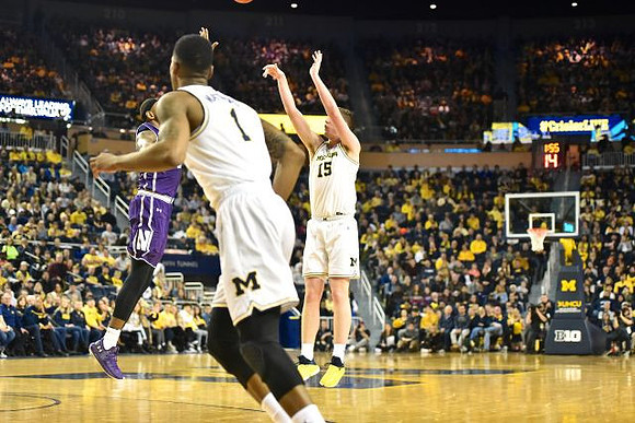 Jon Teske (15) and Charles Matthews (1)