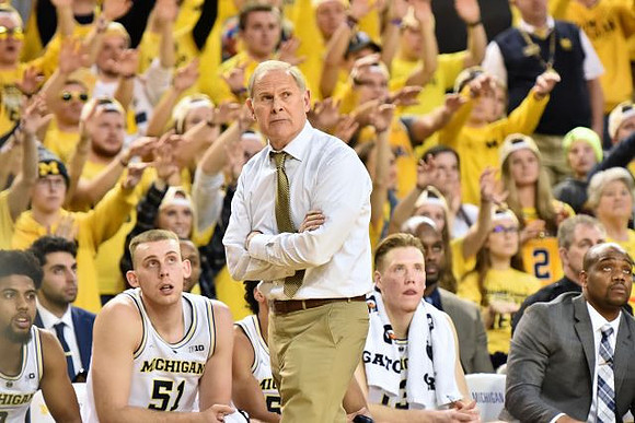 David DeJulius (0), Austin Davis (51), Eli Brooks (55), Ignas Brazdeikis (13), Deandre Haynes, and John Beilein