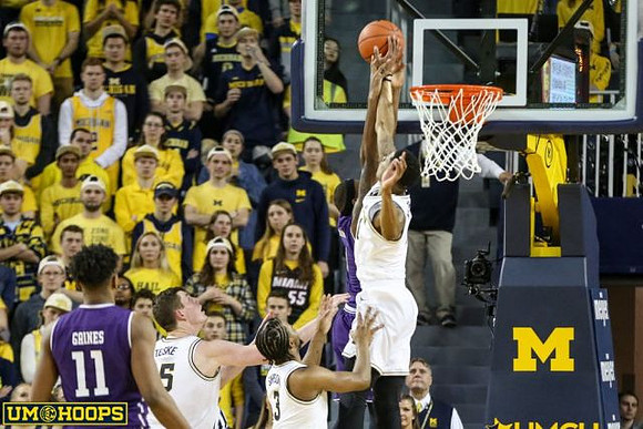 Jon Teske (15), Zavier Simpson (3), and Charles Matthews (1)