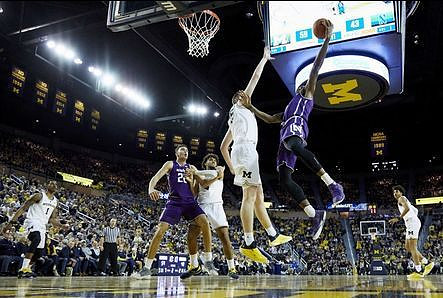 Charles Matthews (1), Isaiah Livers (4), Ignas Brazdeikis (13), and Jordan Poole (2)