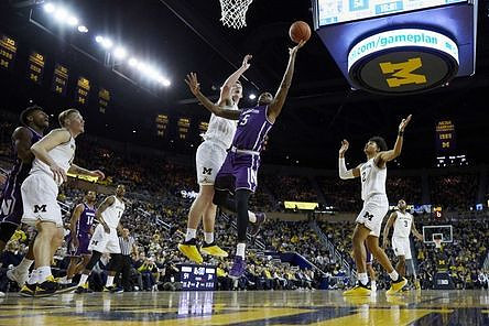 Ignas Brazdeikis (13), Charles Matthews (1), Jon Teske (15), Jordan Poole (2), and Zavier Simpson (3)
