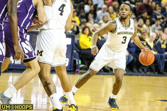 Isaiah Livers (4) and Zavier Simpson (3)