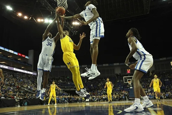 Tarris Reed Jr. (32), Jaelin Llewellyn (3), Kobe Bufkin (2), and Terrance Williams II (5)