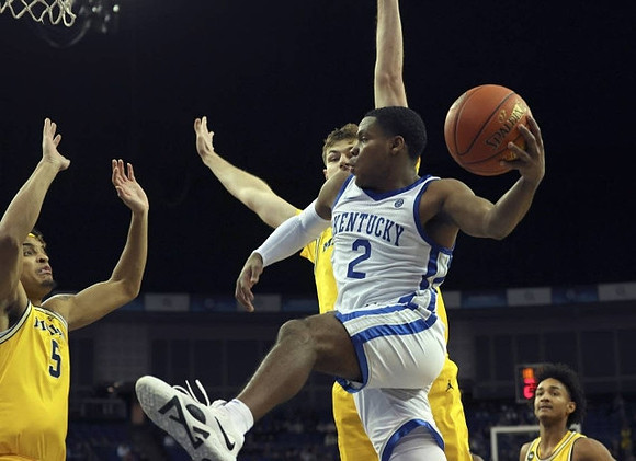Hunter Dickinson (1), Terrance Williams II (5), and Kobe Bufkin (2)