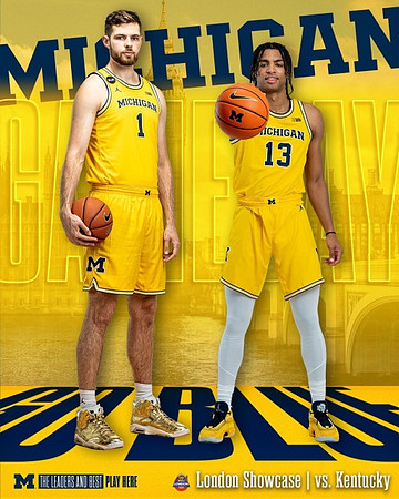 Hunter Dickinson (1) and Jett Howard (13)
