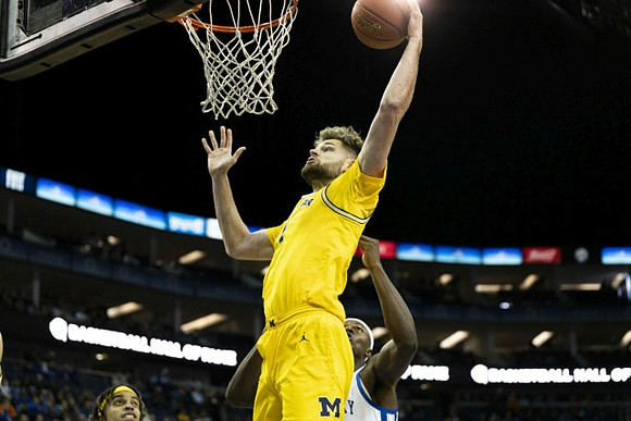 Terrance Williams II (5) and Hunter Dickinson (1)