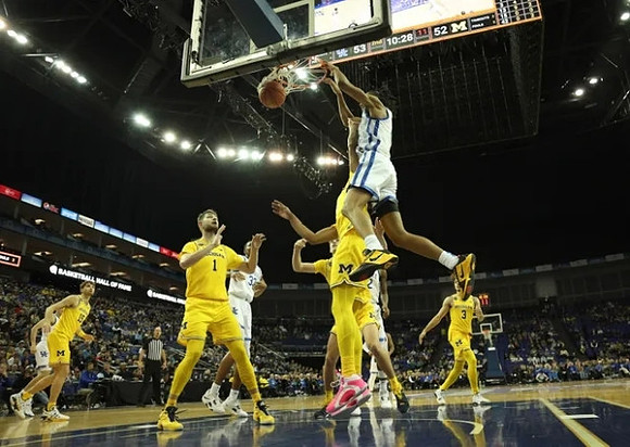 Hunter Dickinson (1), Joey Baker (15), and Jaelin Llewellyn (3)