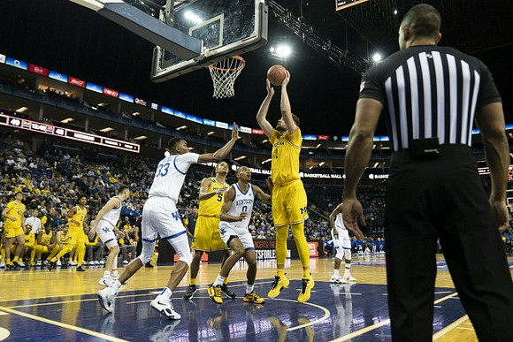 Terrance Williams II (5) and Hunter Dickinson (1)