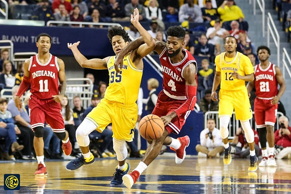 Eli Brooks (55) and Muhammad-Ali Abdur-Rahkman (12)
