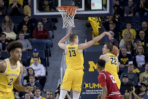 Jordan Poole (2), Moritz Wagner (13), and Duncan Robinson (22)
